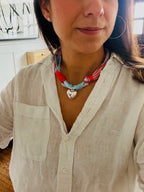 Woman wearing The Amanda silk-blend scarf necklace with a white button-down shirt