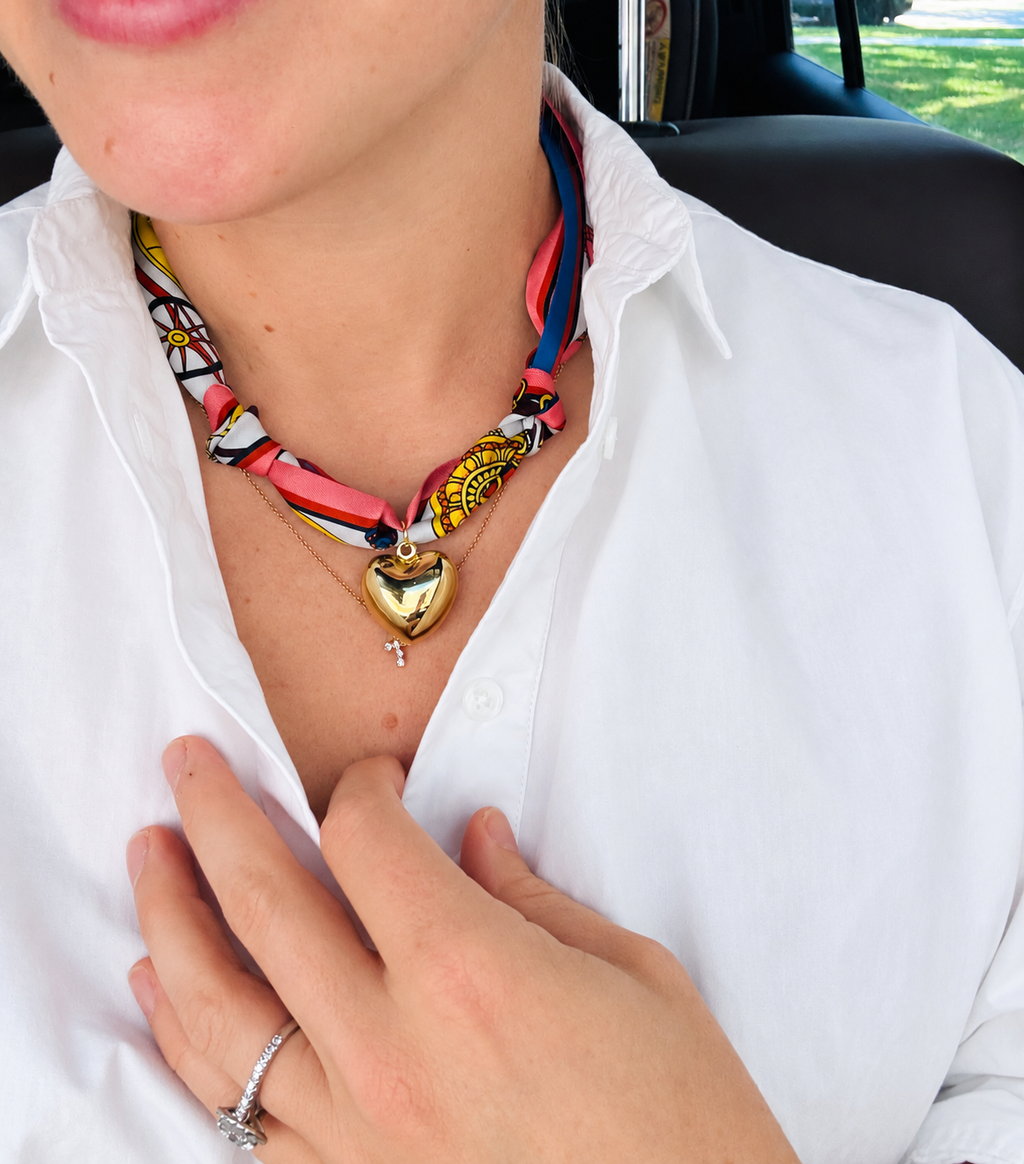 Woman wearing The Droubi silk scarf necklace with a classic white button-down