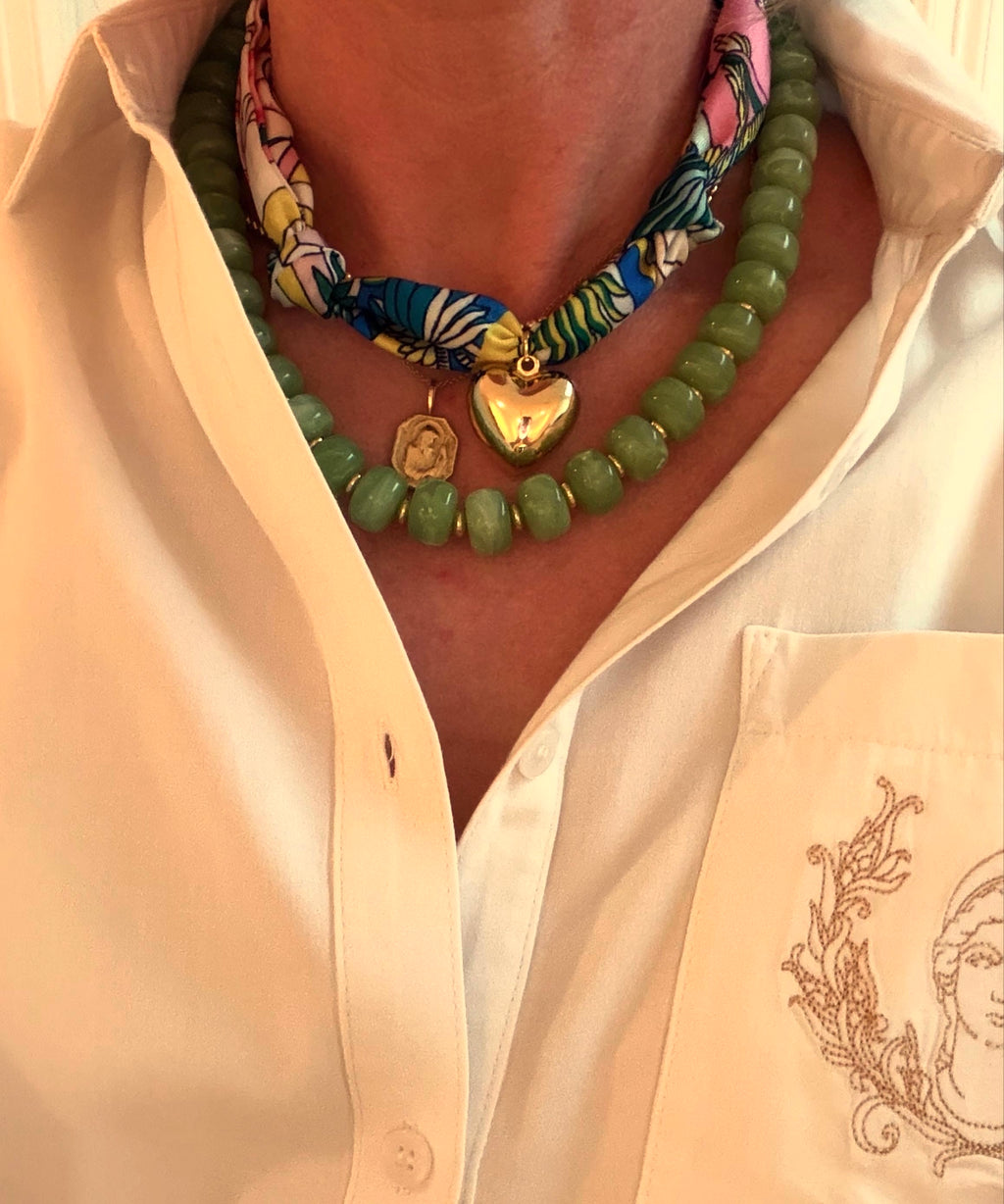 Woman wearing The Whitney silk-blend scarf necklace with a white button-down